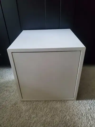 IKEA EKET white storage cabinet. Compact square storage unit with door. Clean, modern design that wo...