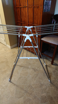 Folding indoor cloths rack used once