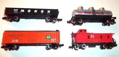 Included are 3 N scale railroad train cars: Cases not included. - Atlas USA Monon 3029 Gondola. Tota...
