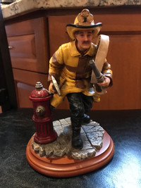 “Fire Alarm” fireman figurine
