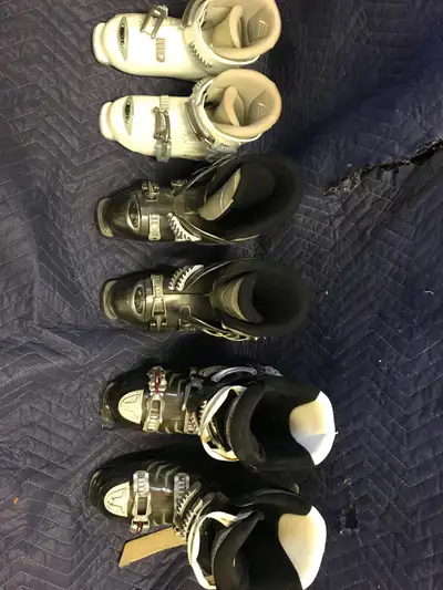 3 pairs of youth ski boots for sale. Not sure of exact sizes, but my kids wore them a couple times b...