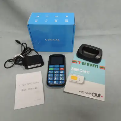 Mobil phone "Ushining" c/w charger/Manual. Sim card. NIB., View more