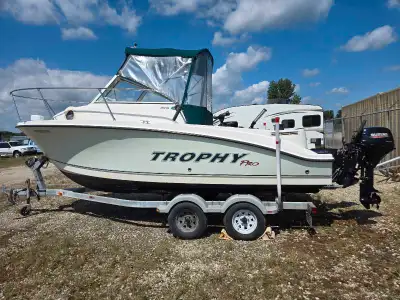 2008 Bayliner 1952WA Trophy Pro, 4.3 mercruiser outboard, Walk around with cuddy. Comes with 2 Canno...