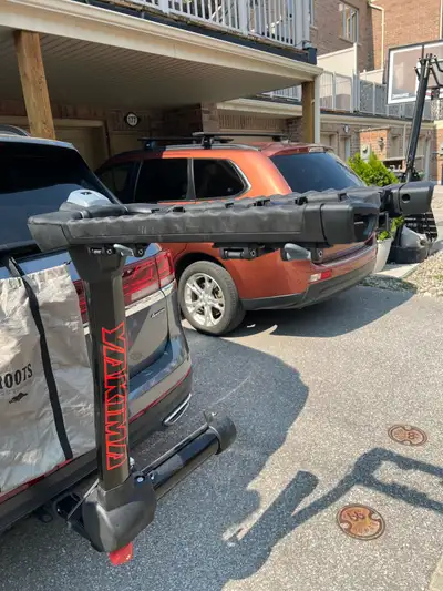 Selling Yakima Full Swing Hitch Bike Rack. Holds up to four bikes. Swings away with only one touch f...