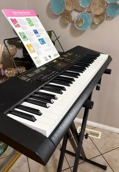 This is Casio CTK-2400, in amazing condition! It comes with power cable adapter, music sheet holder,...