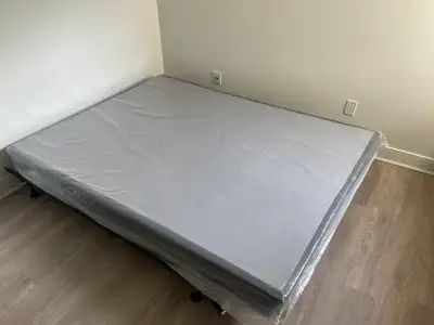 Metal fram with a wooden box spring - pick up only, View more