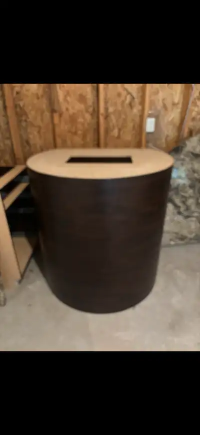 This island is brown with an open back to it. It can be customized to storage or wine rack etc. the...