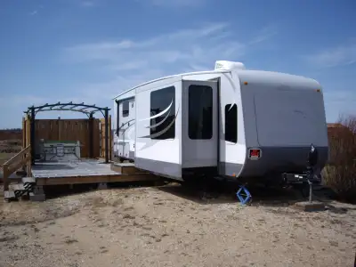 Trailer is located in Misty Meadows at Candle Lake. Excellent Couples trailer with 3 slide outs, dec...