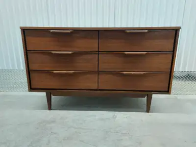 MCM walnut veneer dresser for sale. Measures width of 52 inches by depth of 18.25 inches by height o...