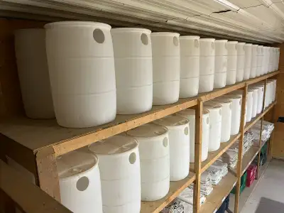 White 55 Gallon Closed Top Plastic Barrels, View more