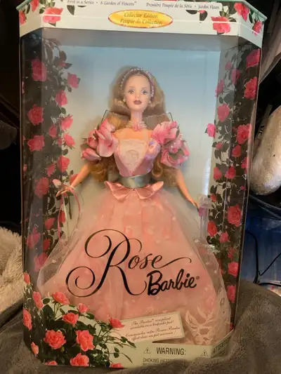 This is a Rose Barbie, First in a Garden of Flowers Collection, still in its original packaging. The...