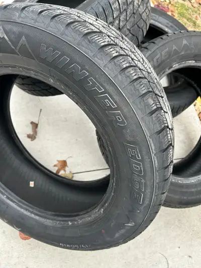 Set of 4 Motomaster Winter Edge snow tires Size: 215/60 r16 Used, likely have a couple of seasons le...