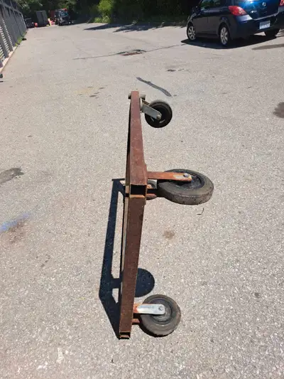 This used trailer dolly features a sturdy frame and wheels, perfect for moving trailers around your...