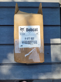 Unused sealed Bobcat hydraulic oil filter #6677652