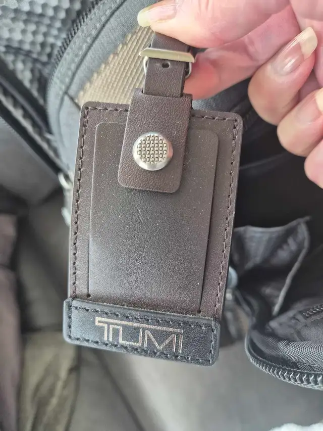 Tumi backpack 509456511832565764