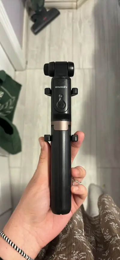 Rechargeable and bluetooth selfie stick. Easily connects to any smartphone device that has a camera!...