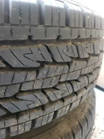 2 tires on Chevy 6 bolt rims. 80%tread tri peak rated price is for both