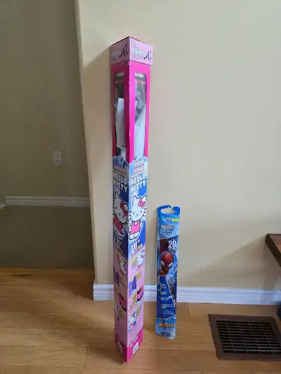 Selling 2x unopened kites. A larger Hello Kitty and smaller Spiderman. $20.00 for both.