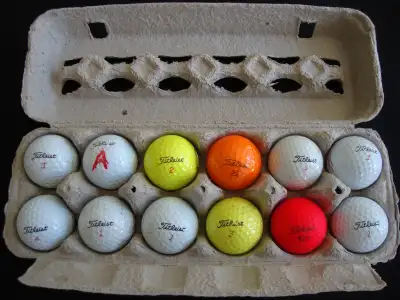 Dozen Titleist Golf Balls, View more