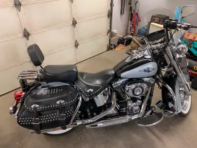 Great bike for city riding and super smooth on the hiway. Lots of accesories (over $5800) Only 42000...