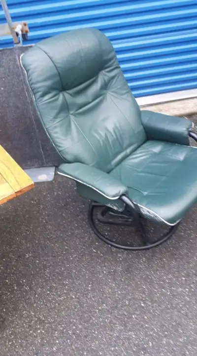 GAMER'S CHAIR -GREEN LEATHER CHAIR SWIVELS AND RECLINES, View more