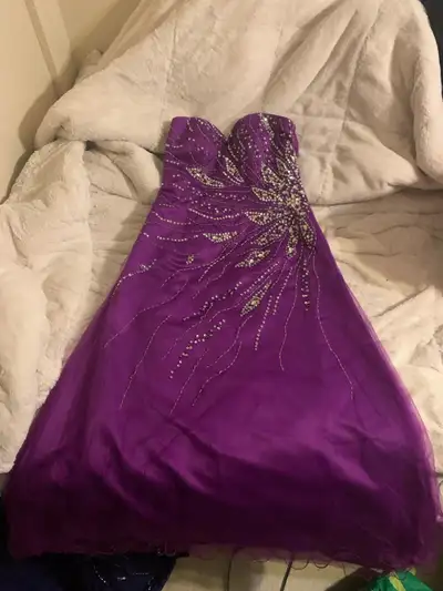Strapless magenta dress, never worn. Fits mid / large $100 OBO, will deliver within calgary area for...