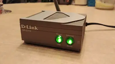 Serveur d’impression WiFi D-Link (USB)- Model: DP-G310 avec Bloc D’alimentation – Testé et Fonctionn...
