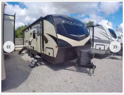 This pre-owned Keystone Cougar 2019 travel trailer is ready for your next adventure, featuring a spa...