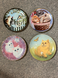 4 plates about cats