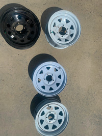 For sale: 15” trailer rims - two 5 bolt and two 6 bolt
