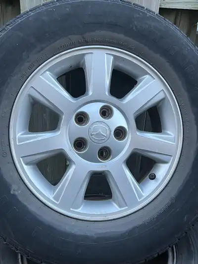 Quatre. Mags en bon état. 235-, 70,16 Mazda tribute Mag
