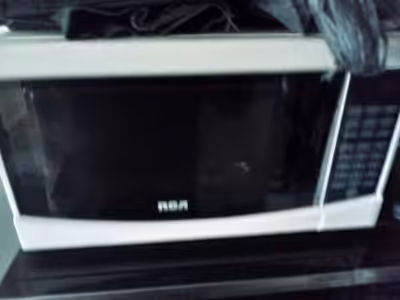For sale digital RCA microwave oven with turn table, removable glass plate for cleaning, 45.00, in g...