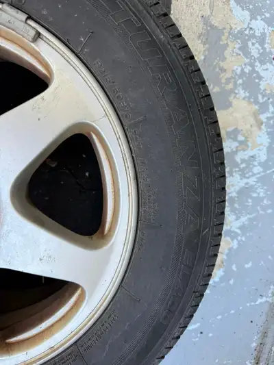 4 alloys for sale with all seasons tires. Really good condition. 16 inches.