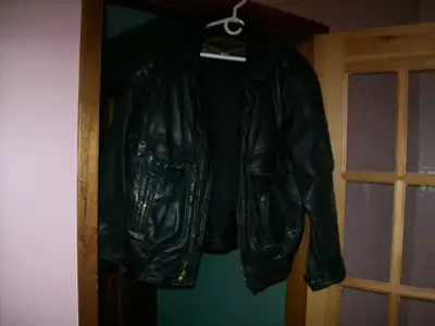 leather jacket and sunglasses, View more