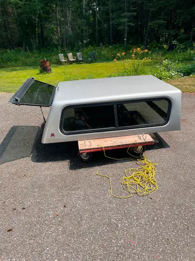 2009 Chevy Colorado truck cap Approximately 6 feet long and 5 feet wide - in good condition. Will fi...