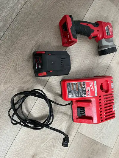Milwaukee battery, charger and flashlight