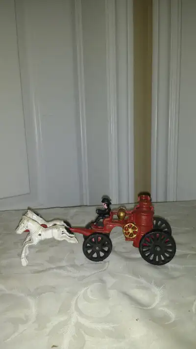 cast iron fire truck water pump wagon, great for collectors, display, great condition, check out our...