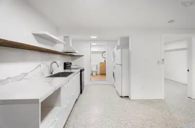 This bright, open concept two bedroom, one bath, basement apartment is conveniently located in the s...