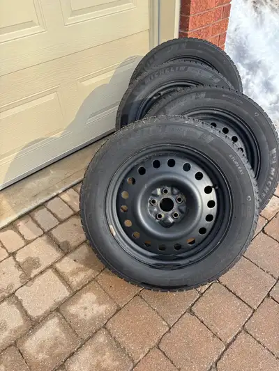 Set of 4 Michelin X-Ice Snow winter tires mounted on steel rims. • Tire size: 225/60R18 • Michelin X...