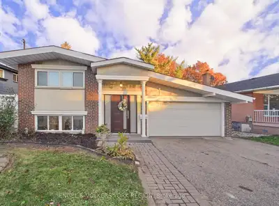 A detached side-split house offering 3+1 bedrooms and 3 bathrooms stands out with soaring cathedral...