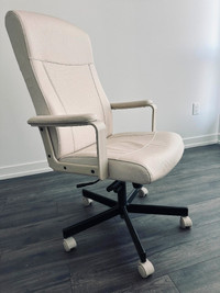 White swivel leather chair for sale in North York