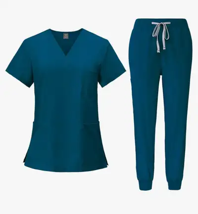 These brand new Women's Scrubs in teal, size Medium, are the perfect blend of comfort and sustainabi...
