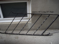 Re claimed rot black iron railing