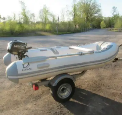 For Sale: 10ft Zodiac Cadet inflatable boat with a 3.5HP Mercury outboard motor (built-in gas tank)...