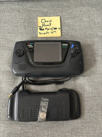 Sega game gear missing both back covers with SIGA power pack 