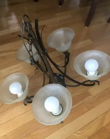 2 Chandeliers. One is Antique Wrought Iron. Lights from 5$, View more