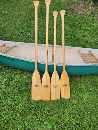 Lightweight portage canoe Comes with 4 feather brand paddles 2x 52 inch 2x 58 inch Not looking for t...