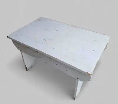 Charming vintage wooden step stool with authentic chippy white paint and rustic farmhouse appeal. Li...