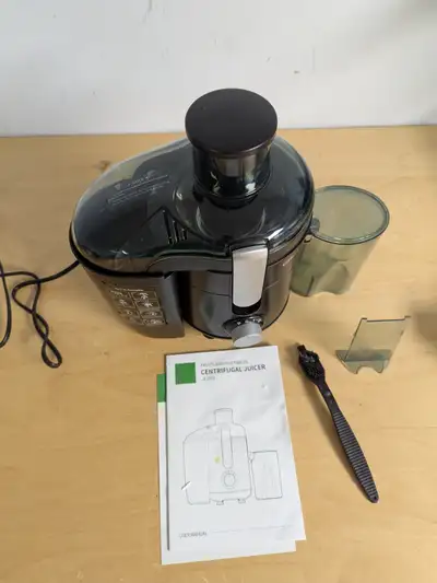 Condition - Used - fair Extract fresh, nutrient-rich juice with the GDOR Centrifugal Juicer in Black...