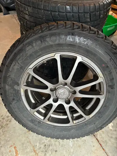 Used. Set of 4 tires on rims. Tires are 245/65/17 Yokohama ice guard. Rim is 17 x 7.5. Was on Honda...